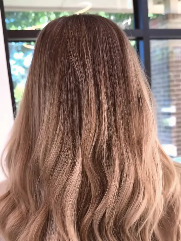Soft dimensional lived-in blonde with a natural blend after the color refresh