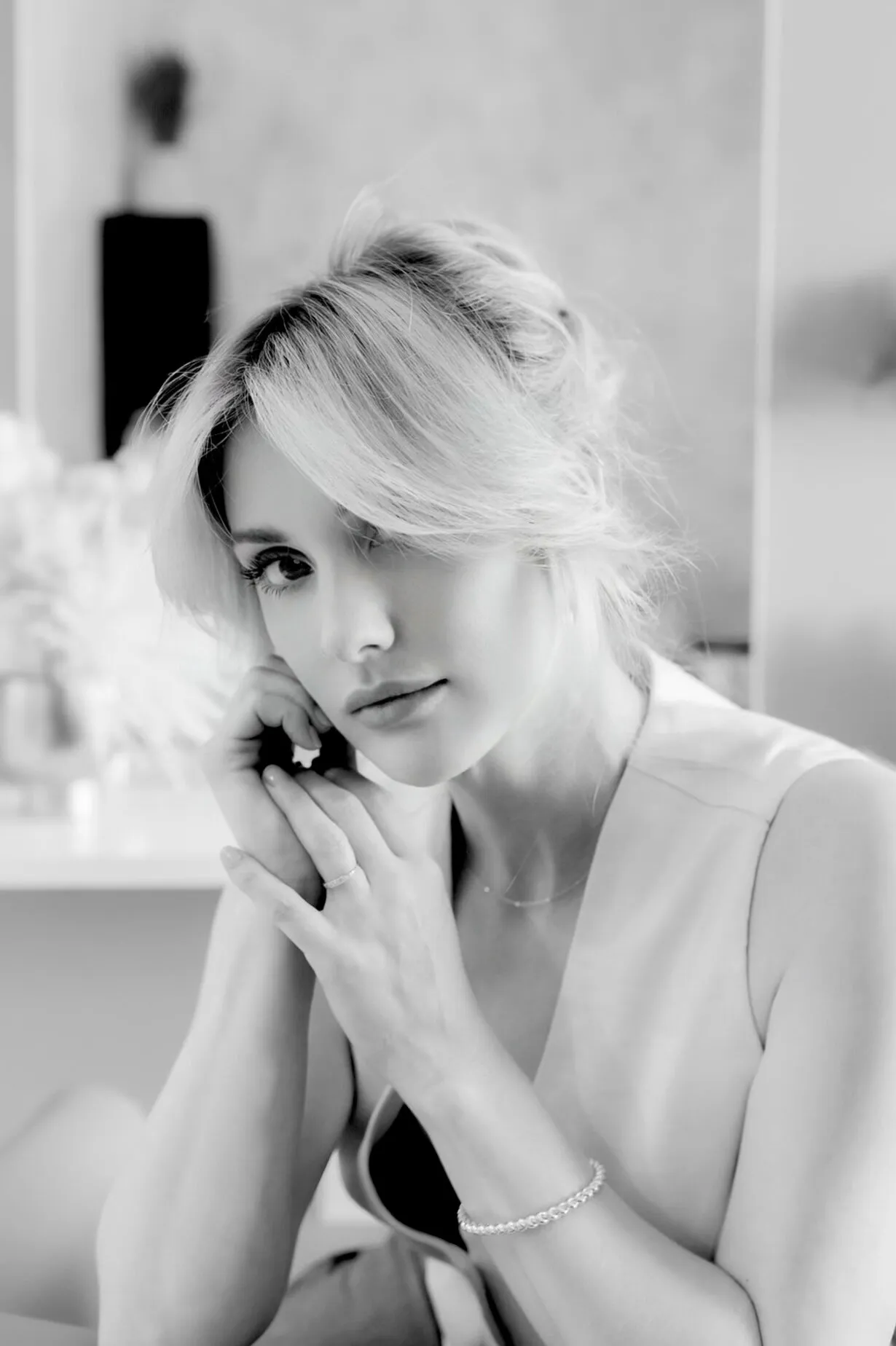 Editorial portrait of a Gilded Locks blonding client